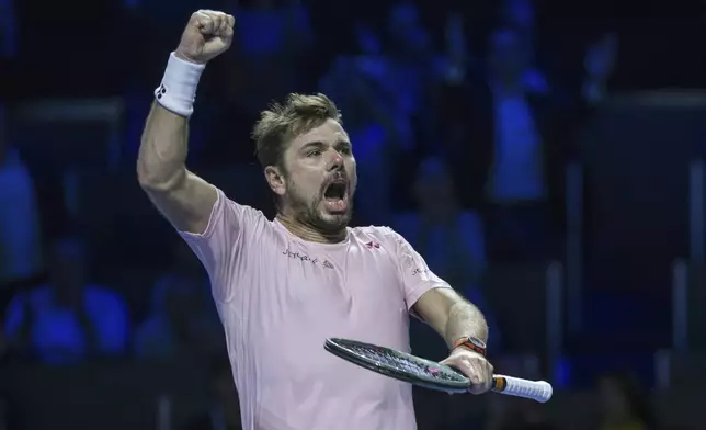 Switzerland's Stan Wawrinka celebrates defeating France's Adrian Mannarino in a first round match at the Swiss Indoors tennis tournament in Basel, Switzerland, Wednesday, Oct. 23, 2024. (Georgios Kefalas/Keystone via AP)