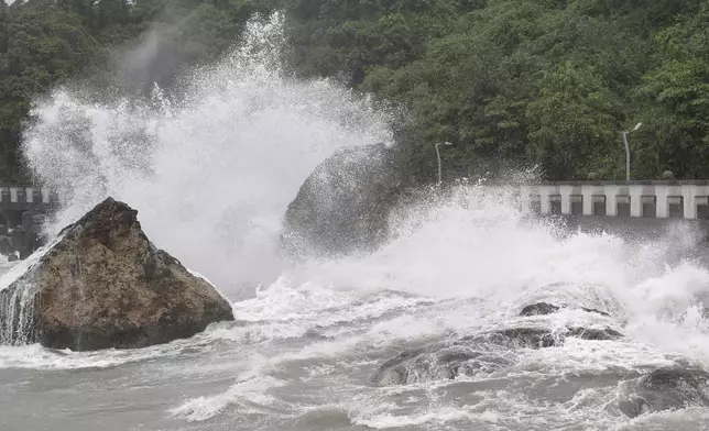 Waves crash onto the coastline of Kaohsiung, southern Taiwan, Wednesday, Oct. 2, 2024, as Typhoon Krathon approaches to Taiwan. (AP Photo/Chiang Ying-ying)