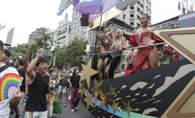 Participants attend the annual Taiwan LGBT Pride parade in Taipei, Taiwan, Saturday, Oct. 26, 2024. (AP Photo/Chiang Ying-ying)