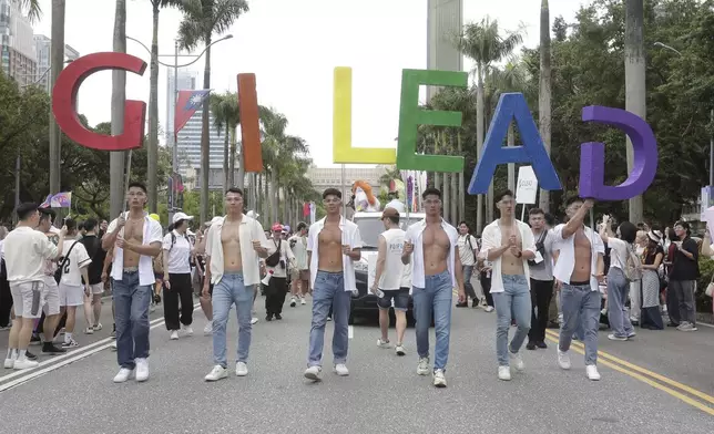 Participants attend the annual Taiwan LGBT Pride parade in Taipei, Taiwan, Saturday, Oct. 26, 2024. (AP Photo/Chiang Ying-ying)