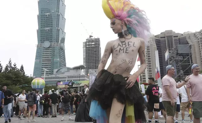 A participant poses during the annual Taiwan LGBT Pride parade in Taipei, Taiwan, Saturday, Oct. 26, 2024. (AP Photo/Chiang Ying-ying)