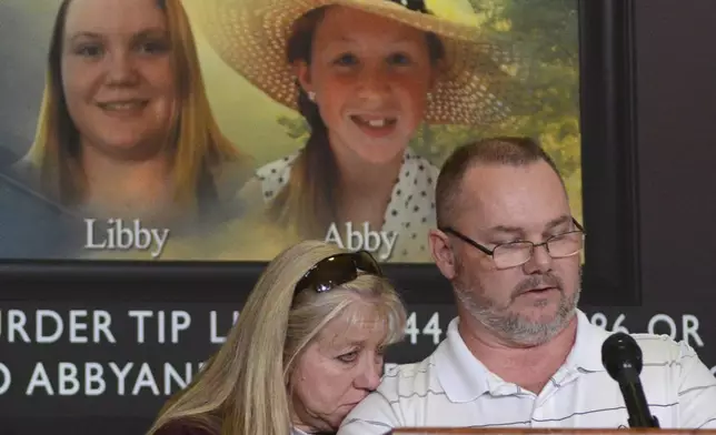 FILE - Grandparents of victim Libby German, Becky Patty, left, and her husband Mike Patty, speak during a news conference for the latest updates on the investigation of the double homicide of Liberty German and Abigail Williams on Thursday, March 9, 2017, at Carroll County Courthouse in Delphi, Ind. (J. Kyle Keener/The Pharos-Tribune via AP, File)