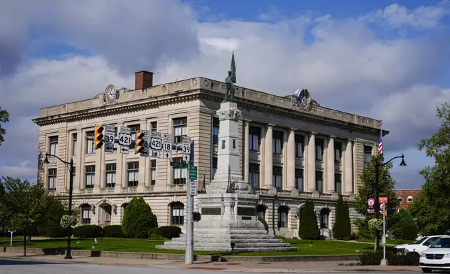 The Soldiers and Sailors Monument on the grounds of the Carrol County Court House is shown in Delphi, Ind., Tuesday, Oct. 1, 2024. (AP Photo/Michael Conroy)