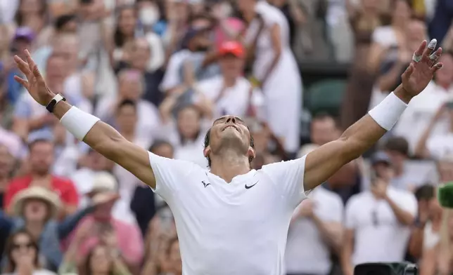 FILE - Spain's Rafael Nadal celebrates after beating Taylor Fritz of the US in a men's singles quarterfinal match on day ten of the Wimbledon tennis championships in London, Wednesday, July 6, 2022, as he announced he will retire from tennis at age 38 following the Davis Cup finals in November. (AP Photo/Kirsty Wigglesworth, File)