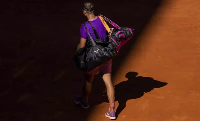 FILE - Spain's Rafael Nadal leaves the court after losing against Germany's Alexander Zverev at the Mutua Madrid Open tennis tournament in Madrid, Spain, Friday, May 7, 2021. (AP Photo/Bernat Armangue, File)