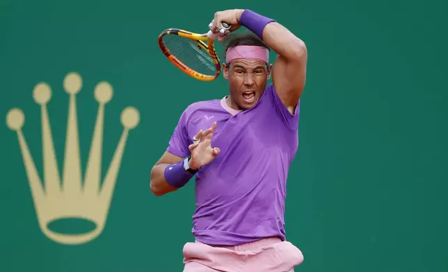 FILE - Rafael Nadal of Spain follows his shot to Andrey Rublev of Russia during their quarterfinal match of the Monte Carlo Tennis Masters tournament in Monaco, Friday, April 16, 2021. (AP Photo/Jean-Francois Badias, File)