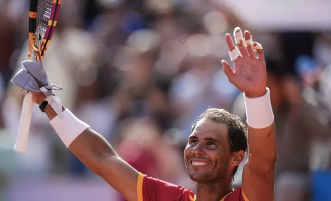 FILE - Rafael Nadal of Spain celebrates his victory over Marton Fucsovics of Hungary during the men's singles tennis competition, at the 2024 Summer Olympics, Sunday, July 28, 2024, in Paris, France, as he has announced he will retire from tennis at age 38 following the Davis Cup finals in November. (AP Photo/Manu Fernandez, File)