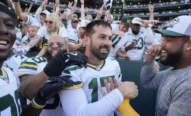 Green Bay Packers place kicker Brandon McManus (17) celebrates after kicking the game-winning field goal in the second half of an NFL football game, Sunday, Oct. 20, 2024, in Green Bay, Wis. The Packers won 24-22. (AP Photo/Morry Gash)