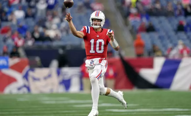 New England Patriots quarterback Drake Maye passes the ball during the second half of an NFL football game against the Houston Texans, Sunday, Oct. 13, 2024, in Foxborough, Mass. (AP Photo/Steven Senne)