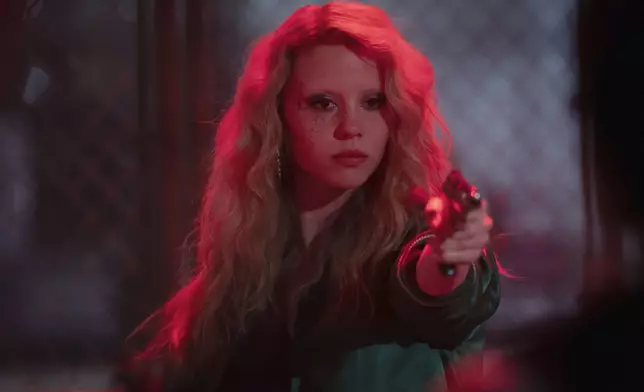 This image released by A24 shows Mia Goth in a scene from "MaXXXine." (Justin Lubin/A24 via AP)