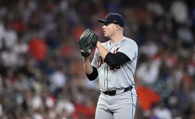 Detroit Tigers starting pitcher Tarik Skubal prepares to throw during the sixth inning of Game 1 of an AL Wild Card Series baseball game, Tuesday, Oct. 1, 2024, in Houston. (AP Photo/Kevin M. Cox)