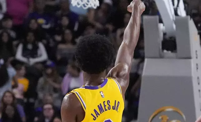 Los Angeles Lakers guard Bronny James shoots and misses during the first half of a preseason NBA basketball game against the Minnesota Timberwolves, Friday, Oct. 4, 2024, in Palm Desert, Calif. (AP Photo/Mark J. Terrill)