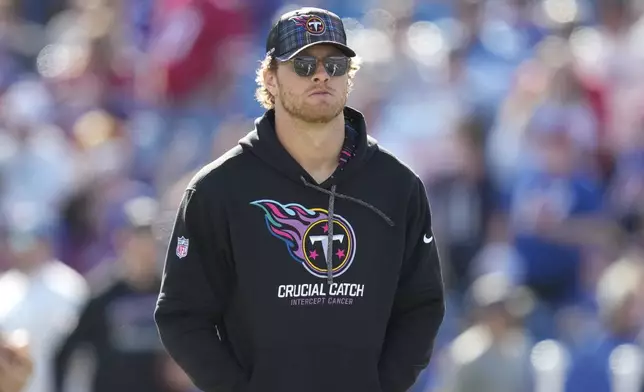 Tennessee Titans quarterback Will Levis stands on the field before an NFL football game against the Buffalo Bills, Sunday, Oct. 20, 2024, in Orchard Park, N.Y. (AP Photo/Charles Krupa)