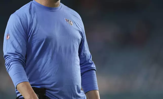 Tennessee Titans head coach Brian Callahan gestures during the second half of an NFL football game against the Miami Dolphins, Monday, Sept. 30, 2024, in Miami Gardens, Fla. (AP Photo/Brennan Asplen)