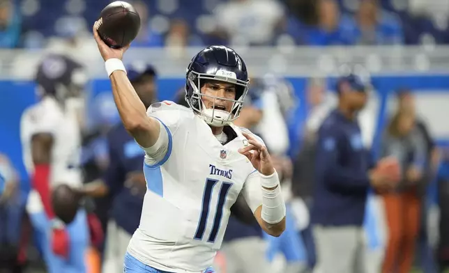 Tennessee Titans quarterback Mason Rudolph (11) before an NFL football game against the Detroit Lions, Sunday, Oct. 27, 2024, in Detroit. (AP Photo/Carlos Osorio)