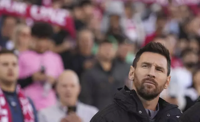 Inter Miami forward Lionel Messi looks on from the sidelines before the start of an MLS soccer match against Toronto FC in Toronto Saturday Oct. 5, 2024. (Chris Young/The Canadian Press via AP)