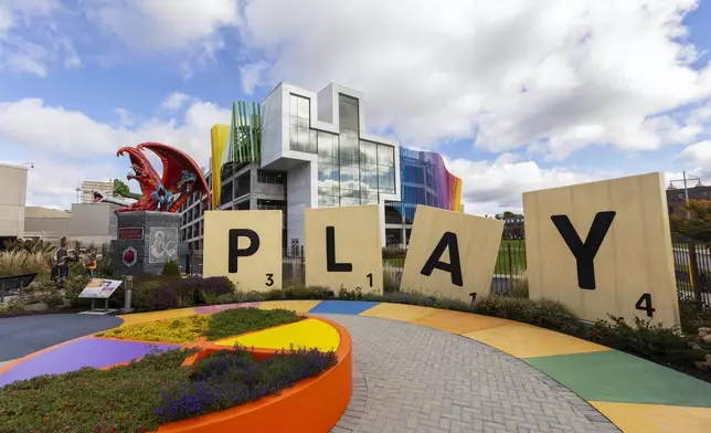 Large scrabble letters line the outdoor Hasbro Game Park at The Strong National Museum of Play, Tuesday, Oct. 15, 2024, in Rochester, N.Y. (AP Photo/Lauren Petracca)