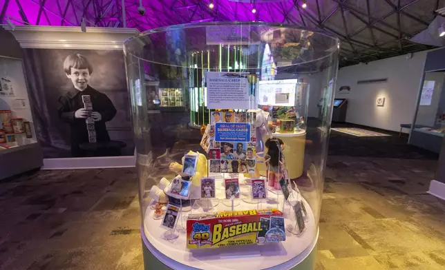 A display of baseball cards inside of the Toy Hall of Fame at The Strong National Museum of Play, Tuesday, Oct. 15, 2024, in Rochester, N.Y. (AP Photo/Lauren Petracca)