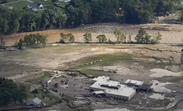 An aerial view of flood-damaged Unicoi County Hospital in the aftermath of Hurricane Helene, Saturday, Sept. 28, 2024, in Erwin, Tenn. (AP Photo/George Walker IV)