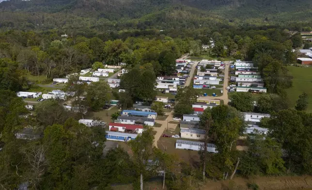 A trailer park that was inundated with water during a flash flood is seen in the aftermath of Hurricane Helene, Tuesday, Oct. 1, 2024, in Swannanoa, N.C. (AP Photo/Mike Stewart)