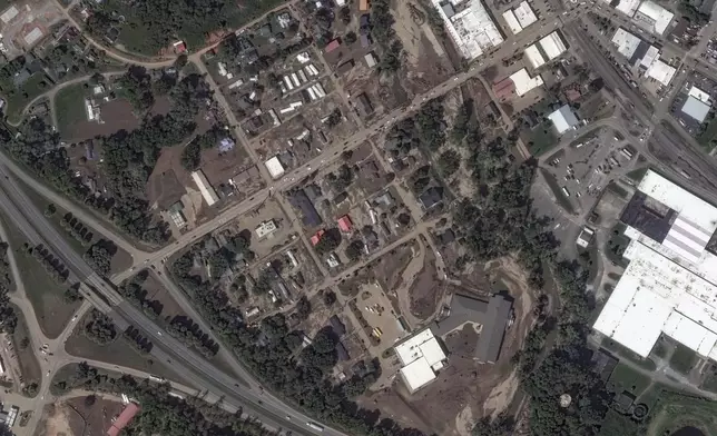 This satellite image released by Maxar Technologies shows damage from Hurricane Helene in Old Fort, N.C., Wednesday, Oct. 2, 2024. (Satellite image ©2024 Maxar Technologies via AP)