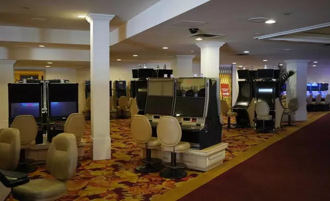 FILE - Shut down slot machines adorn the casino floor in preparation for closing the Tropicana hotel-casino Friday, March 29, 2024, in Las Vegas. (AP Photo/John Locher, File)