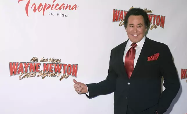 FILE - Wayne Newton poses on the red carpet for the grand opening of his new Las Vegas show, "Once Before I Go," Wednesday, Oct. 28, 2009, at The Tropicana Hotel and Casino. (AP Photo/Eric Jamison, File)