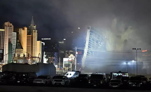 The Tropicana Las Vegas hotel tower is imploded Wednesday, Oct. 9, 2024, in Las Vegas. (AP Photo/David Becker)