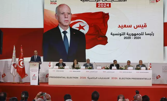 Election officials announce Tunisian president and candidate for re-election Kais Saied as the winner of the presidential elections, in the capital Tunis, Tunisia, Monday, Oct. 7, 2024. (AP Photo/Anis Mili)