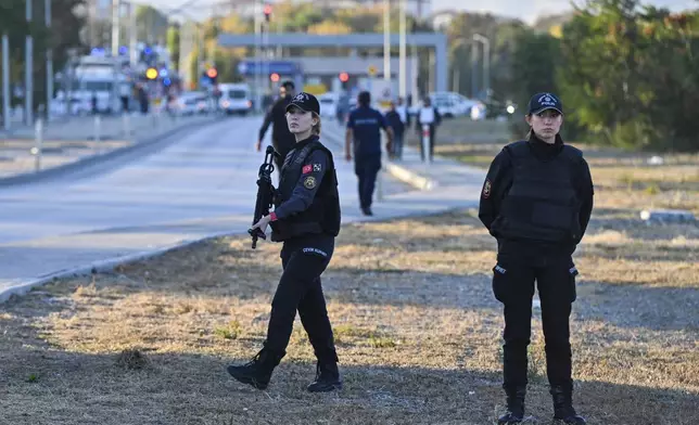 Emergency and security teams are deployed outside of Turkish Aerospace Industries Inc. at the outskirts of Ankara, Turkey, Wednesday, Oct. 23, 2024. (AP Photo)