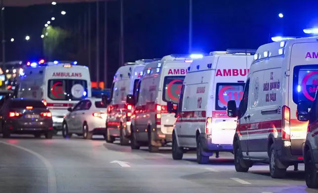 Ambulances wait in line outside of Turkish Aerospace Industries Inc. at the outskirts of Ankara, Turkey, Wednesday, Oct. 23, 2024. (AP Photo)