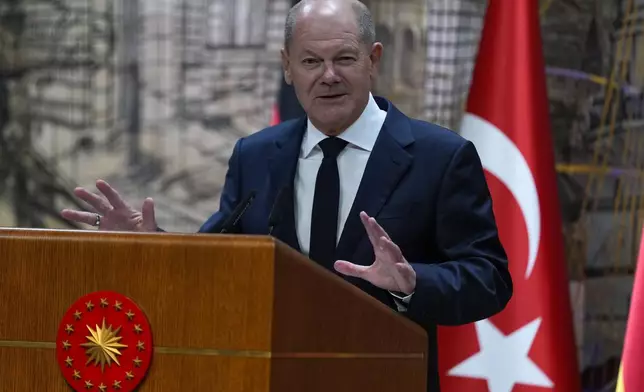 Germany's Chancellor Olaf Scholz, answers journalists' questions during a presser with Turkey's President Recep Tayyip Erdogan, in Istanbul, Turkey, Saturday, Oct. 19, 2024. (AP Photo/Khalil Hamra)