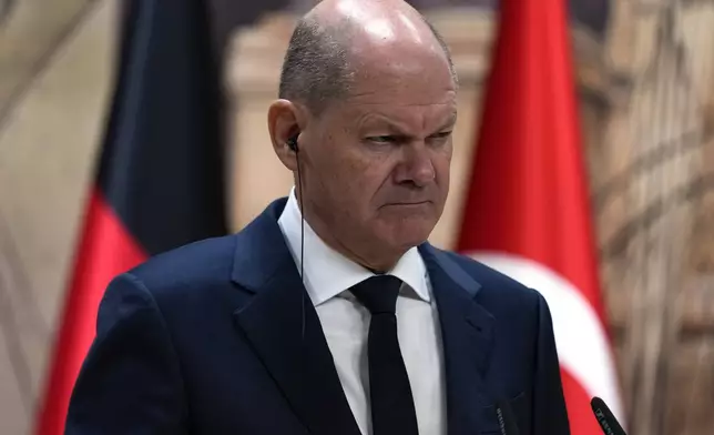 Germany's Chancellor Olaf Scholz, answers journalists questions during a presser with Turkey's President Recep Tayyip Erdogan, in Istanbul, Turkey, Saturday, Oct. 19, 2024. (AP Photo/Khalil Hamra)