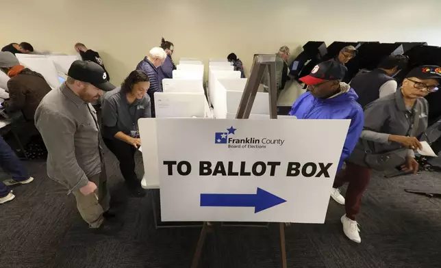 at the Franklin County Board of Elections in Columbus, Ohio, Tuesday, Oct. 8, 2024. (AP Photo/Paul Vernon)