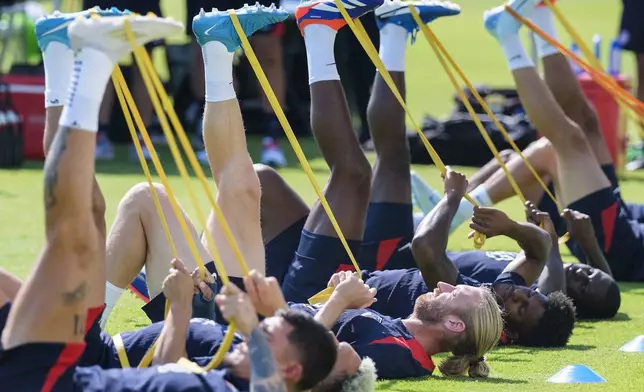 United States defender Tim Ream stretches with the team during practice, Friday, Oct. 11, 2024, in Austin, Texas, as the U.S. men's national soccer team prepares play Panama in an international friendly on Saturday. (AP Photo/Rodolfo Gonzalez)