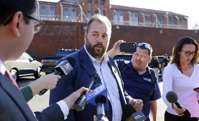 Texas State Rep. John Bucy III speaks to reporters on the pending execution of Robert Roberson during an impromptu press conference outside of the Huntsville Unit of the Texas State Penitentiary, Thursday, Oct. 17, 2024, in Huntsville, Texas. (AP Photo/Michael Wyke)