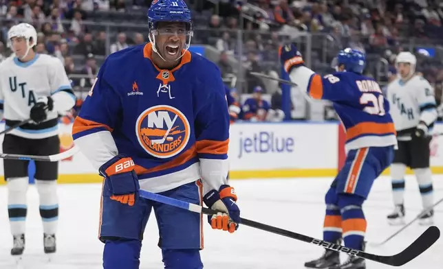 New York Islanders' Anthony Duclair (11) reacts after a call during the second period of an NHL hockey game against the Utah Hockey Club, Thursday, Oct. 10, 2024, in Elmont, N.Y. (AP Photo/Frank Franklin II)