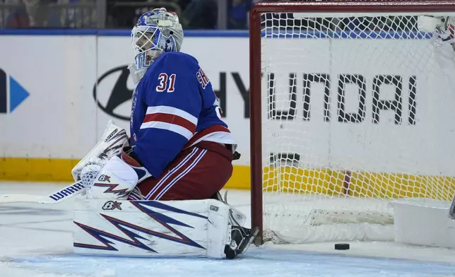 New York Rangers' Igor Shesterkin reacts after Utah Hockey Club's Dylan Guenther scored during the second period of an NHL hockey game, Saturday, Oct. 12, 2024, in New York. (AP Photo/Pamela Smith)