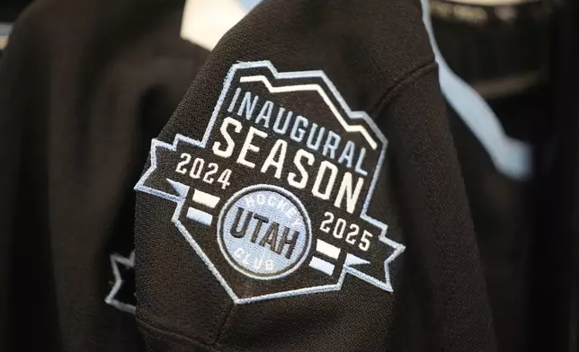 Utah Hockey Club jersey is shown during a tour of the new temporary practice facility locker room at the Olympic Oval Tuesday, Sept. 17, 2024, in Kearns, Utah. (AP Photo/Rick Bowmer)