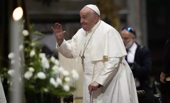 FILE - Pope Francis waves as he arrives for a meeting with diocesan community in the Basilica of St. John Lateran, in Rome, Friday, Oct. 25, 2024. (AP Photo/Alessandra Tarantino, File)