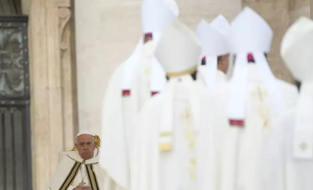 Pope Francis presides over a mass in St. Peter's Square, at the Vatican, for the opening of the second session of the 16th General Assembly of the Synod of Bishops, Wednesday, Oct. 2, 2024. (AP Photo/Gregorio Borgia)