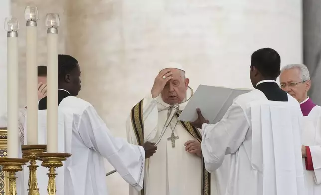 Pope Francis presides over a mass in St. Peter's Square, at the Vatican, for the opening of the second session of the 16th General Assembly of the Synod of Bishops, Wednesday, Oct. 2, 2024. (AP Photo/Gregorio Borgia)