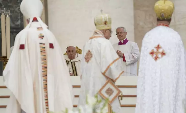 Pope Francis presides over a mass in St. Peter's Square, at the Vatican, for the opening of the second session of the 16th General Assembly of the Synod of Bishops, Wednesday, Oct. 2, 2024. (AP Photo/Gregorio Borgia)