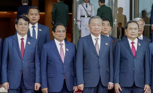 Vietnam's newly elected President Luong Cuong, from left, Prime Minister Pham Minh Chinh, General Secretary of the Communist Party To Lam and Chairman of the National Assembly Tran Thanh Man pose together for photo in Hanoi, Vietnam on Monday, Oct. 21, 2024. (AP Photo/Minh Hoang)