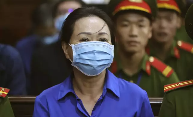 Vietnamese real estate tycoon Truong My Lan sits in court to wait for her verdict on fraud, money laundering and illegal cross-border money transferring in Ho Chi Minh city, Vietnam Thursday, Oct. 17, 2024. (Quynh Tran/VnExpress via AP)