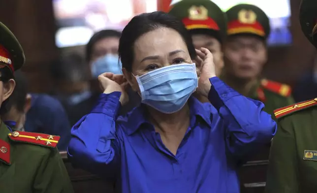 Vietnamese real estate tycoon Truong My Lan sits in court to wait for her verdict on fraud, money laundering and illegal cross-border money transferring in Ho Chi Minh city, Vietnam Thursday, Oct. 17, 2024. (Quynh Tran/VnExpress via AP)