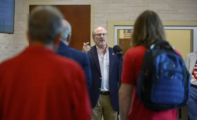 EagleAI CEO Rick Richards presents his program to find duplicate voter registrations at the Forsyth County Voter Registrar in Cumming, Ga., June 28, 2024. (Jamie Spaar/Atlanta Journal-Constitution via AP)