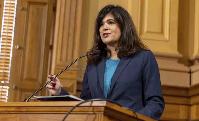 State Rep. Saira Draper, D-Atlanta, makes public comment against new proposed rules during a Georgia Election Board meeting at the Capitol in Atlanta on Sept. 20, 2024. (Arvin Temkar/Atlanta Journal-Constitution via AP)