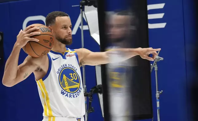 Golden State Warriors' Stephen Curry poses for a photo during the NBA basketball team's media day Monday, Sept. 30, 2024, in San Francisco. (AP Photo/Godofredo A. Vásquez)