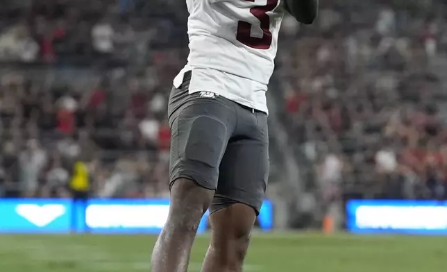 Washington State wide receiver Tre Shackelford celebrates a run for a first down during the first half of an NCAA college football game against San Diego State Saturday, Oct. 26, 2024, in San Diego. (AP Photo/Gregory Bull)